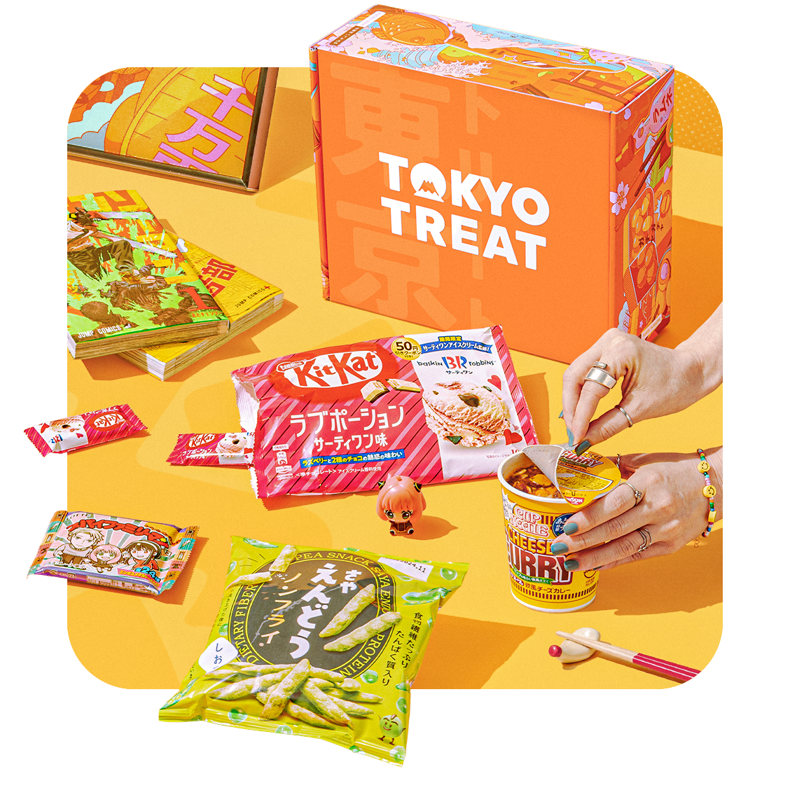 Orange TokyoTreat box with snacks around it on orange background 