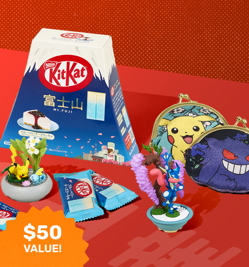  Assorted Pokémon merch and KitKats on red background 