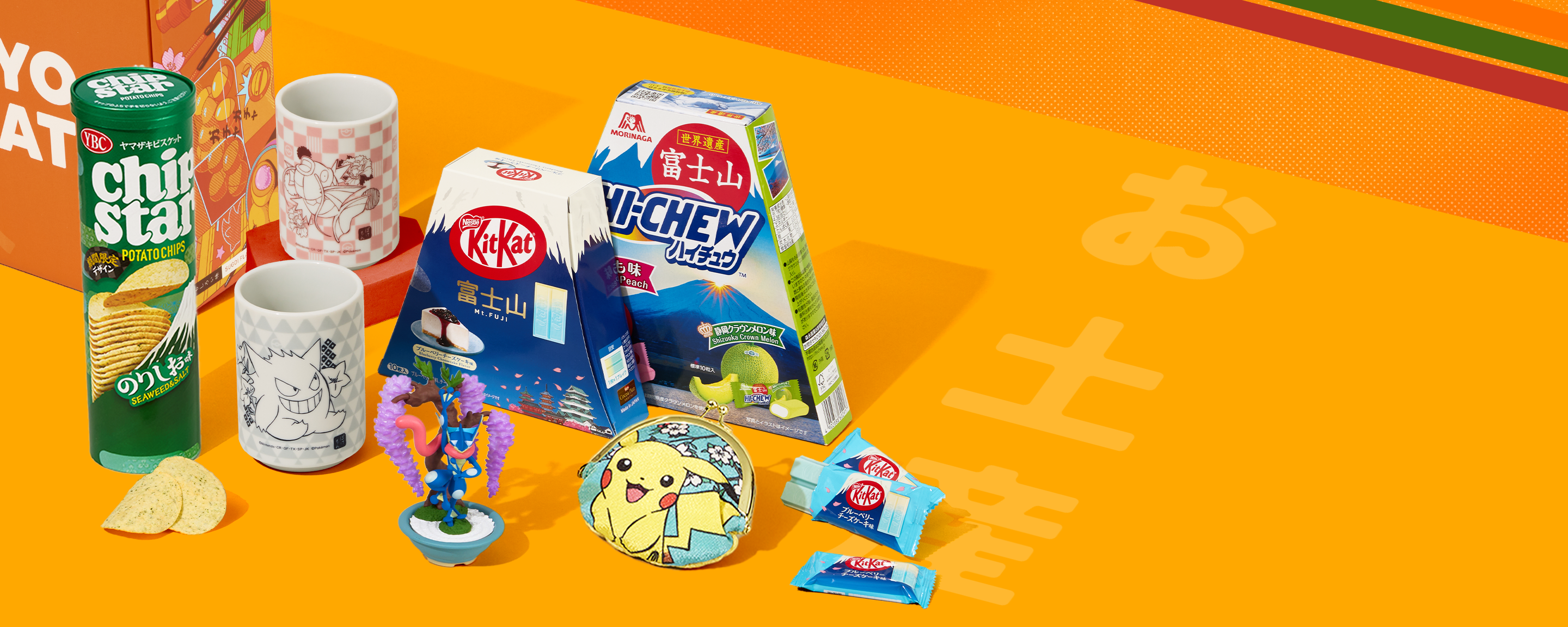 Japan character merch and snacks on yellow background with stripes 
