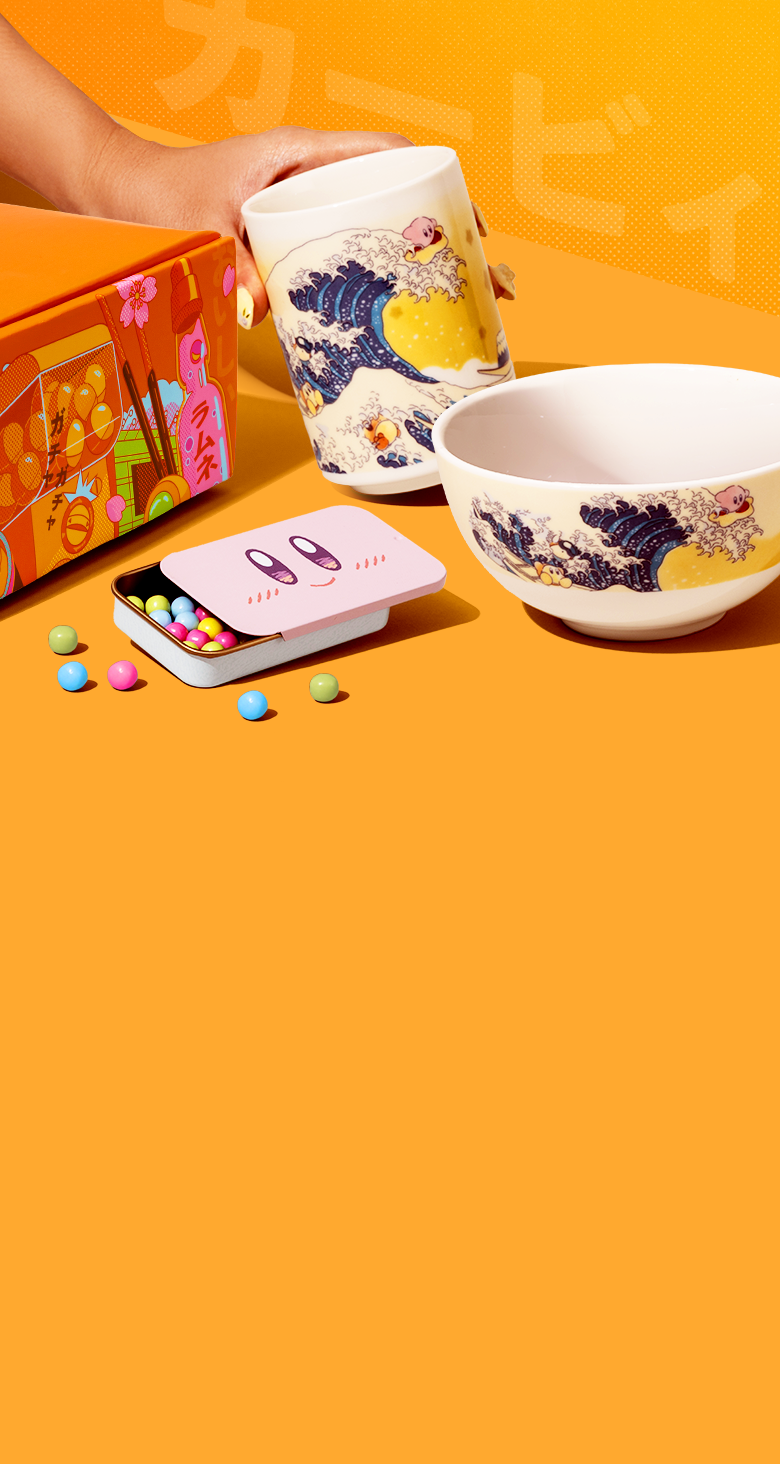 Kirby merch and snacks on a yellow background 