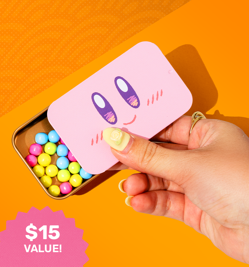 Kirby candy tin on yellow background 