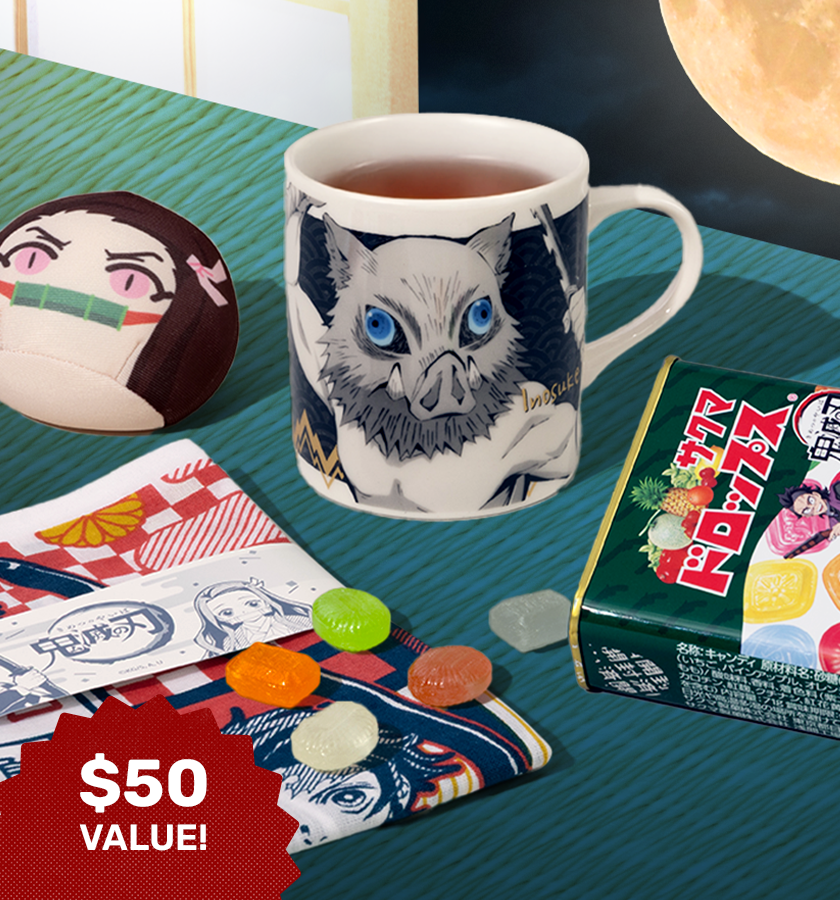 Demon Slayer merch and snacks on green background 