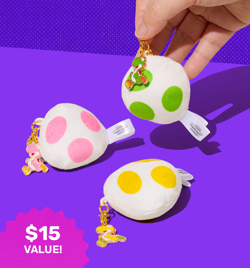 Yoshi egg keychains on purple background 