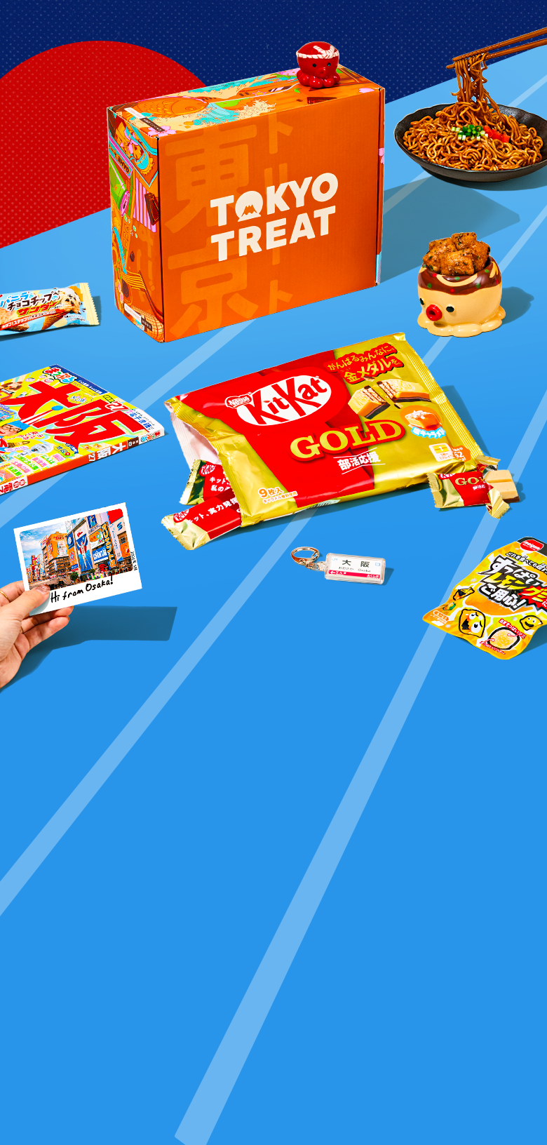 Orange TokyoTreat box with Osaka-themed snacks on blue background with red sun in the back