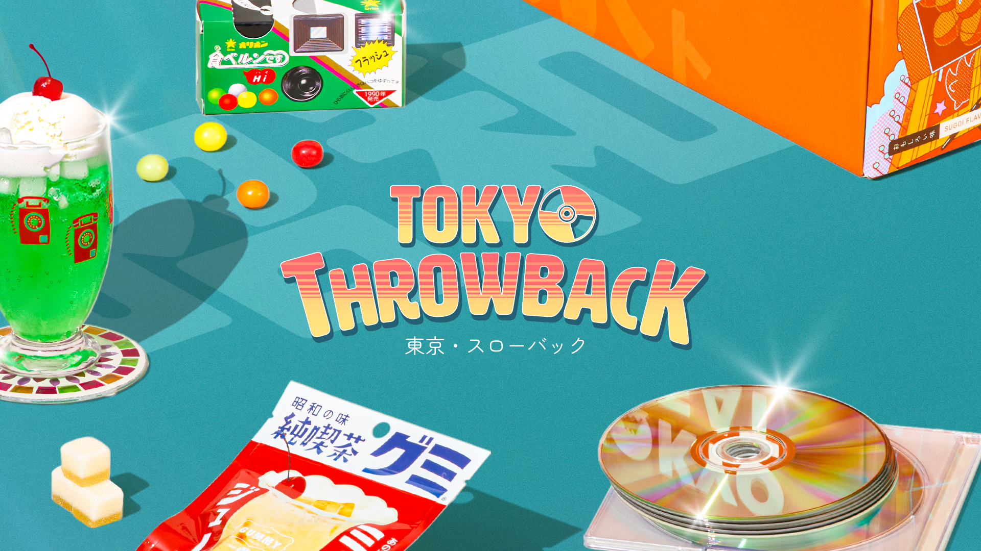 Orange TokyoTreat box with retro-themed snacks around it on teal background 