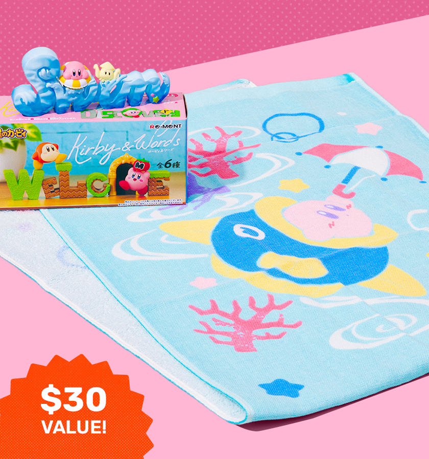 Kirby beach towel and figurine set on a pink background