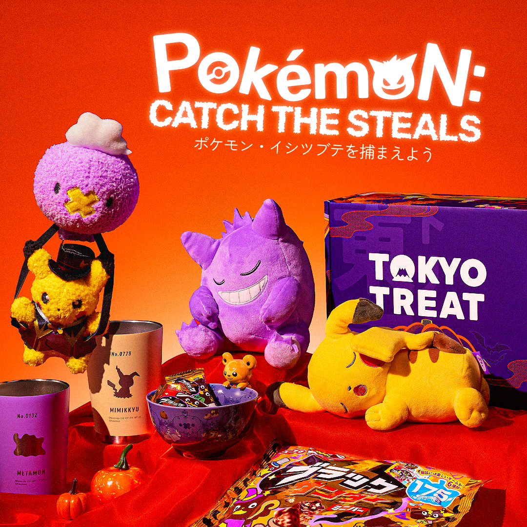 Violet TokyoTreat box surrounded with Pokemon merch and snacks