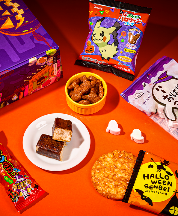 Rice puff and other crispy snacks on a Halloween background