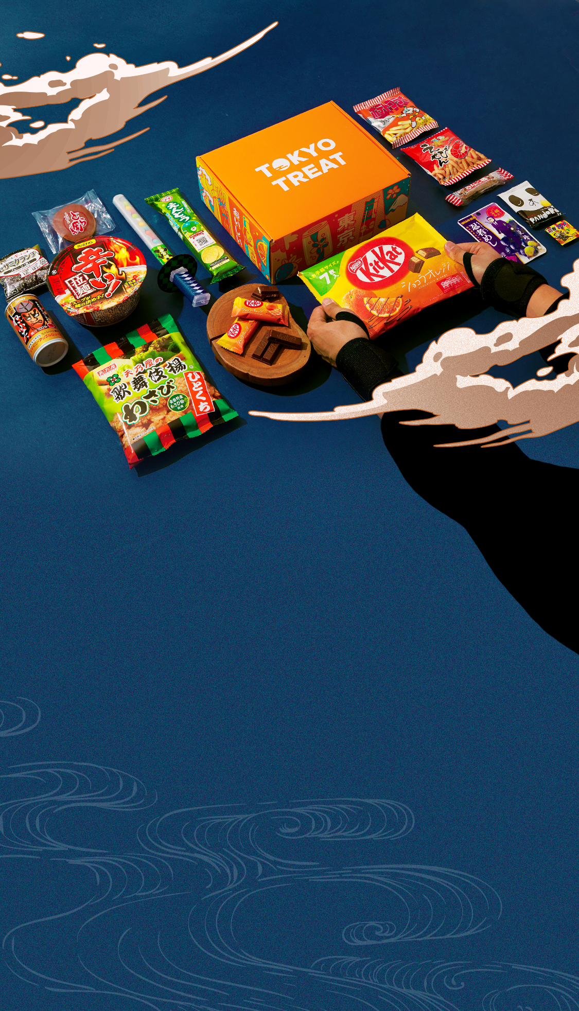 TokyoTreat box sits on a dark navy blue background, surrounded by May box items.