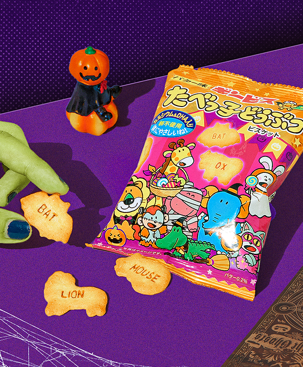 Tabekko Trick-or-Treat Biscuits on purple background with green hand