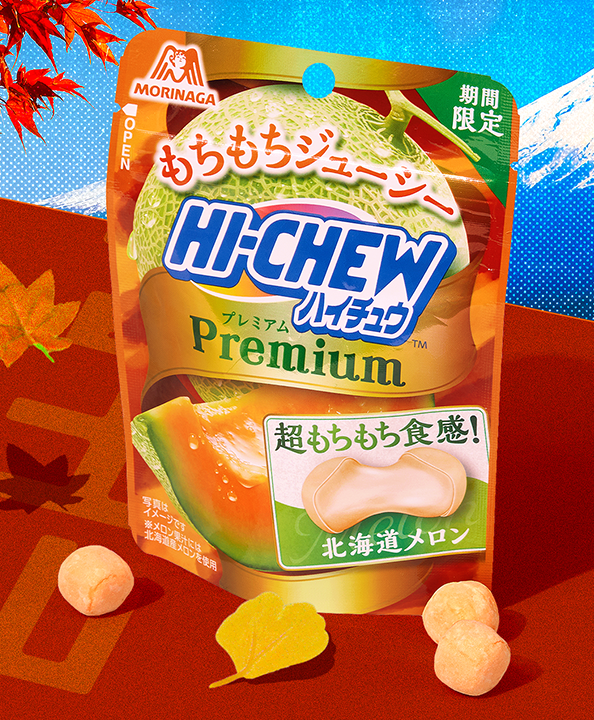 Melon Hi-Chews on red background with Mt. Fuji in the background
