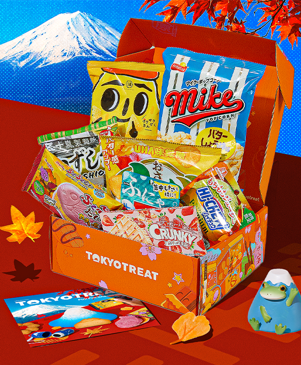 Orange TokyoTreat box with fall themed snacks and Mt. Fuji in the background