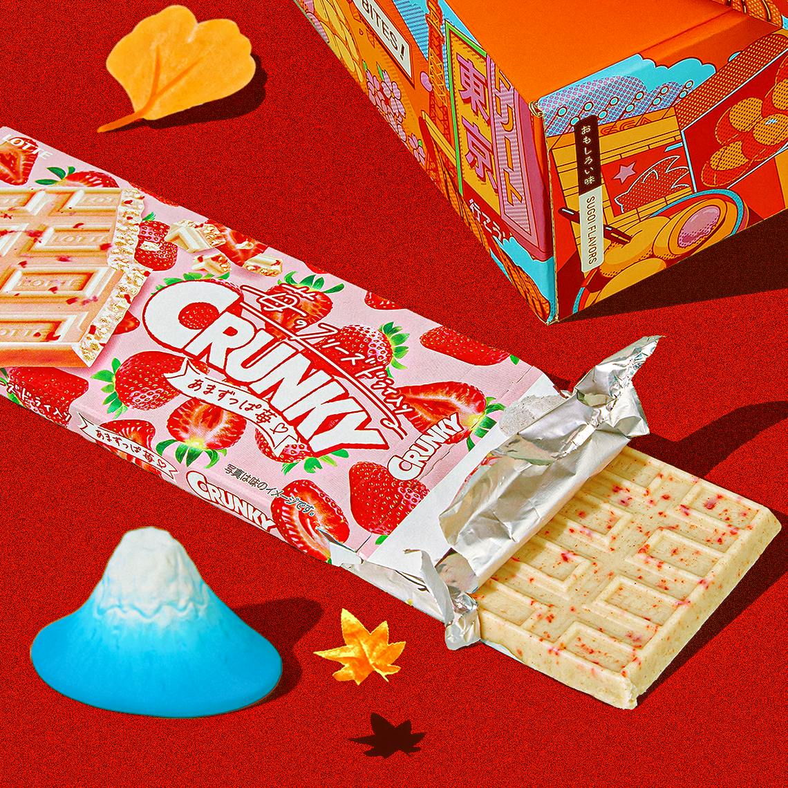 CRUNKY strawberry white chocolate on red background with Mt. Fuji figurine
