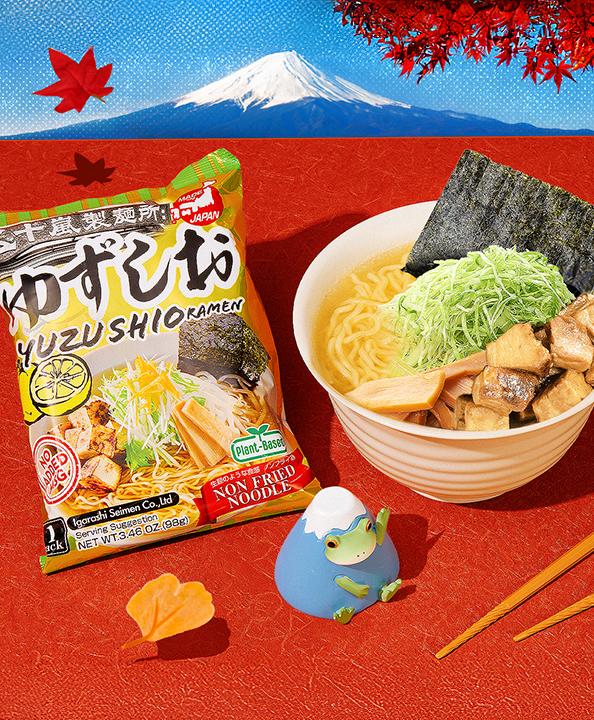 Yuzu shio ramen on red background with Mt. Fuji in the back