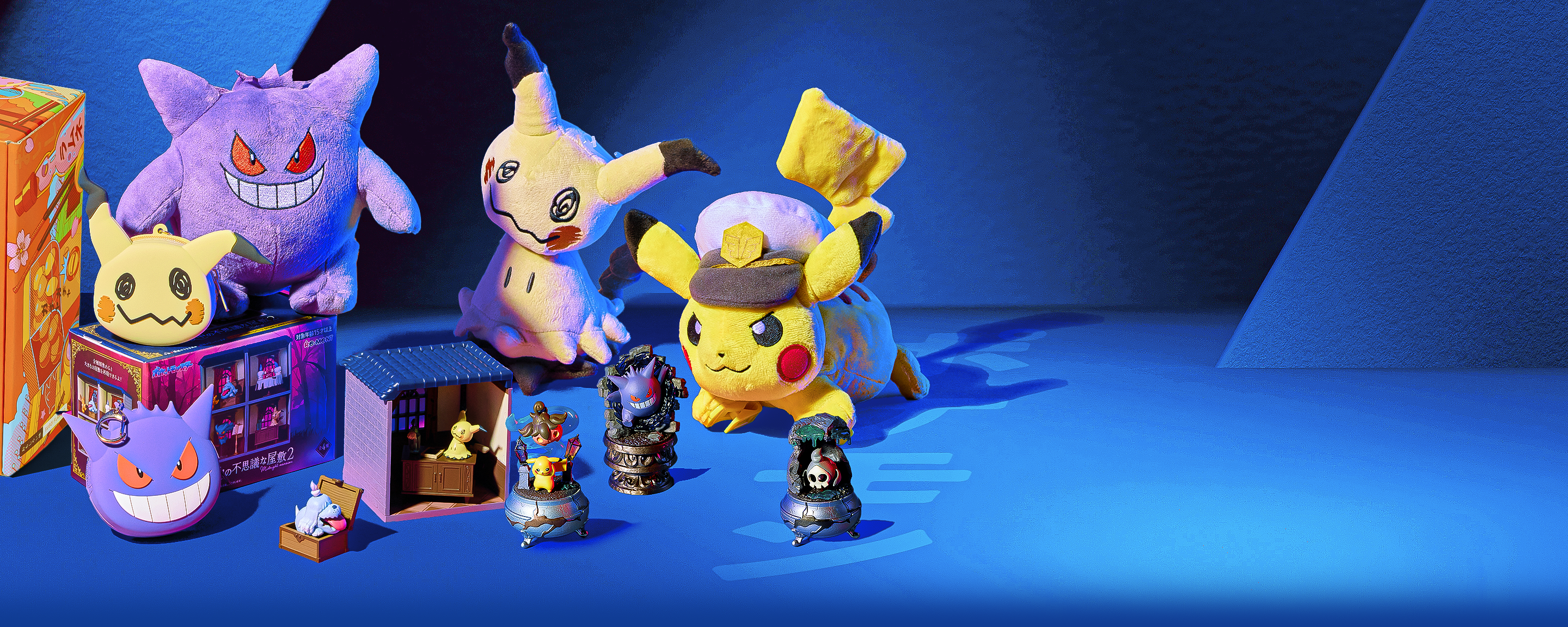 Pokémon merch on a blue background