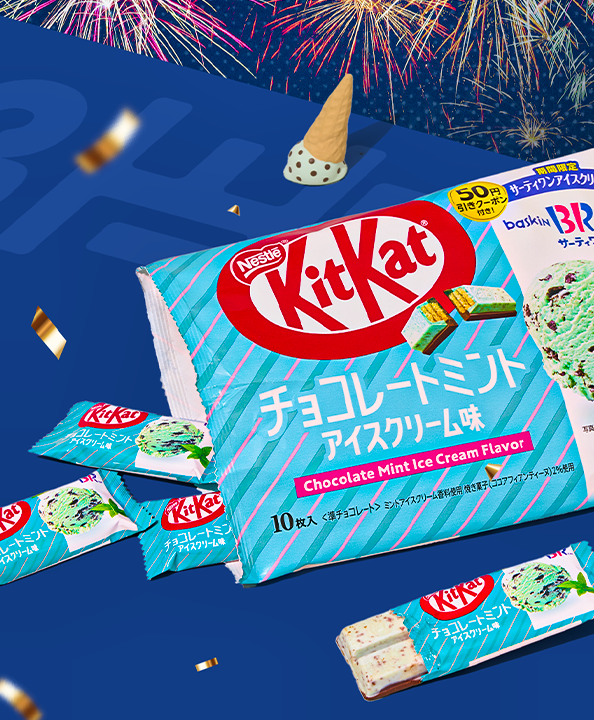 Blue package of Mint Ice Cream KitKats on blue background with fireworks
