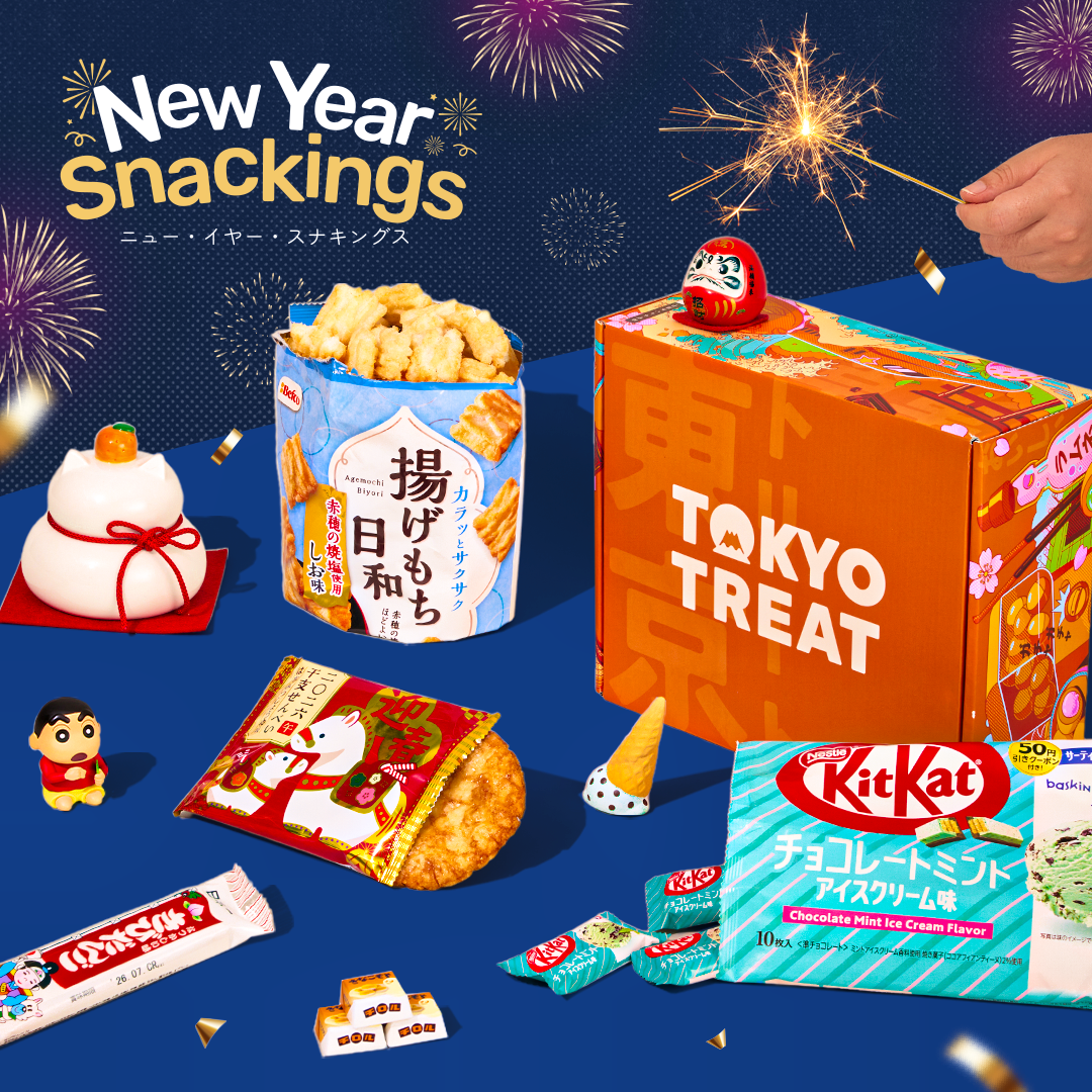 Orange TokyoTreat box with New Year-themed snacks on blue background