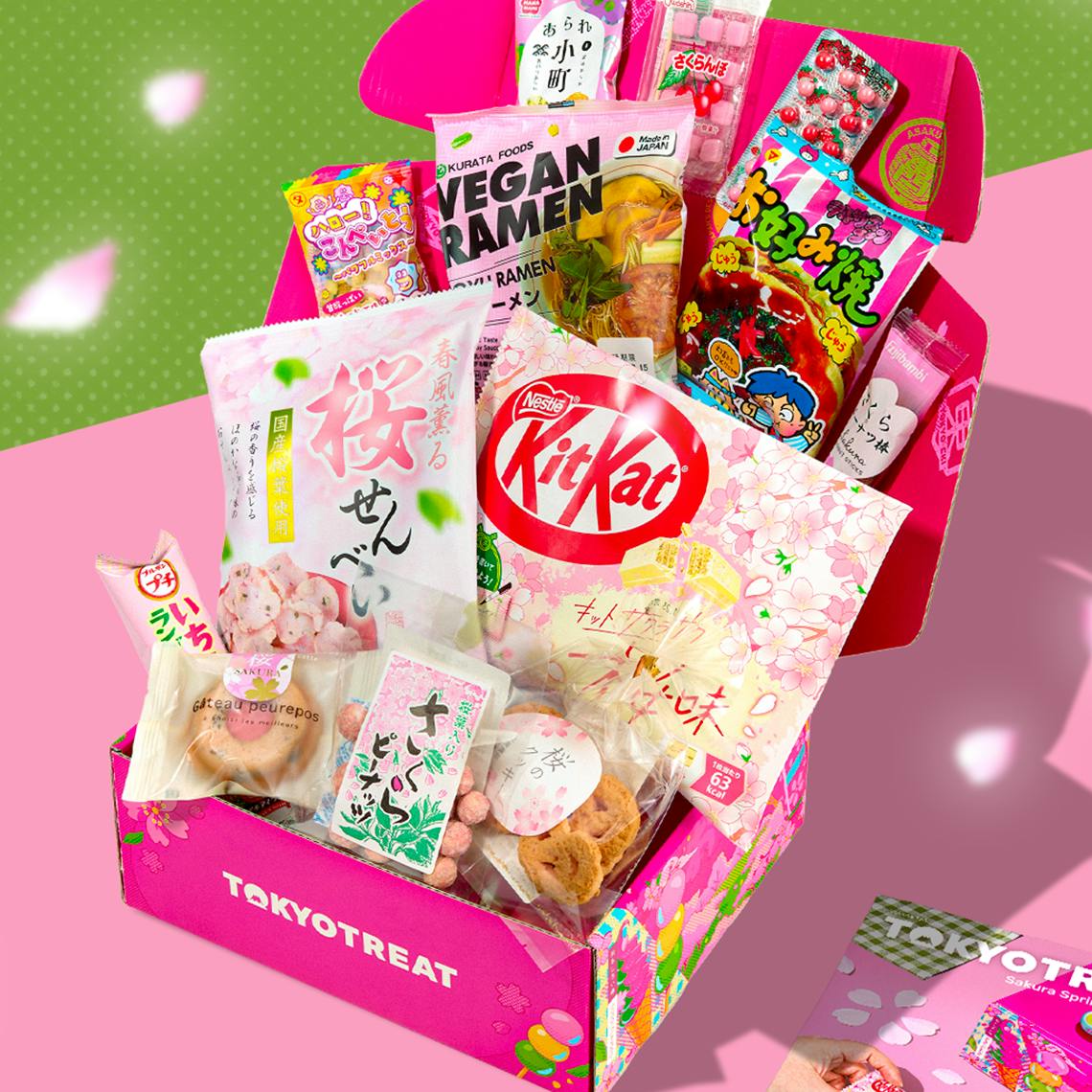 TokyoTreat box with sakura-themed snacks on pink background