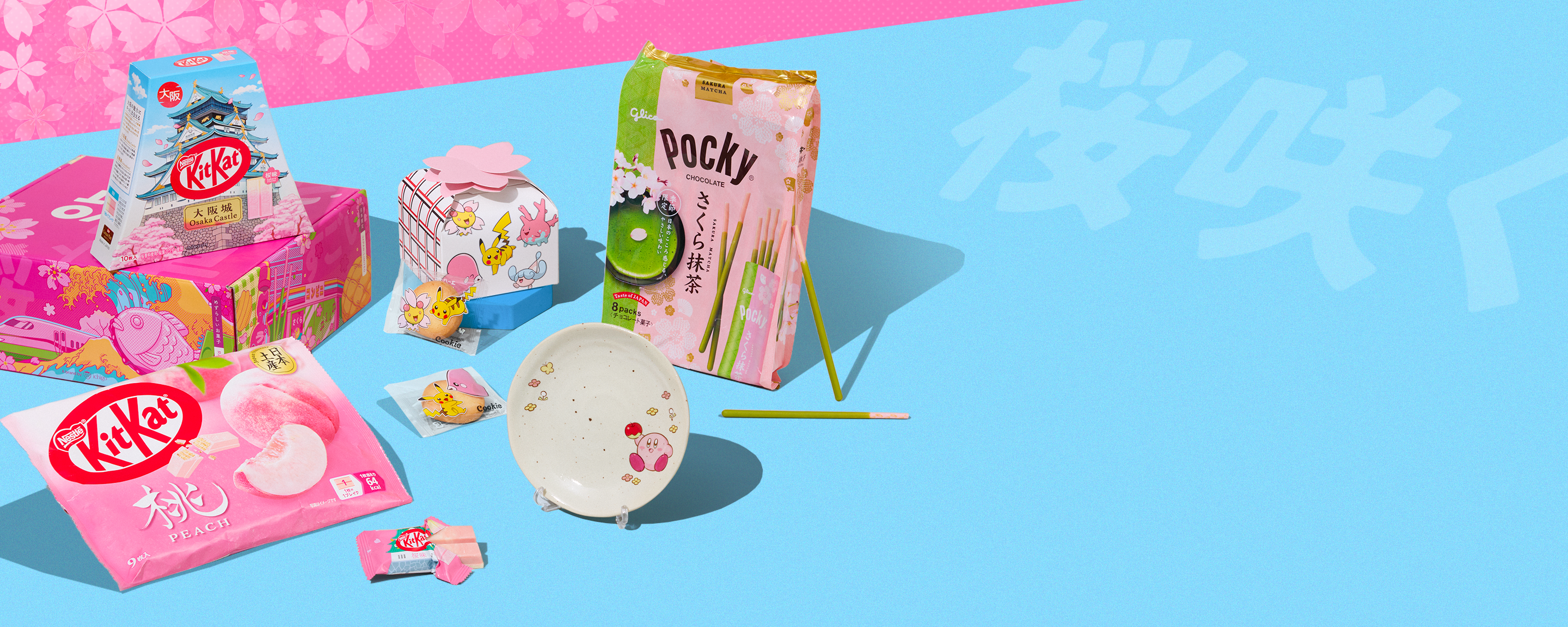 Sakura snacks and Kirby plate on blue background