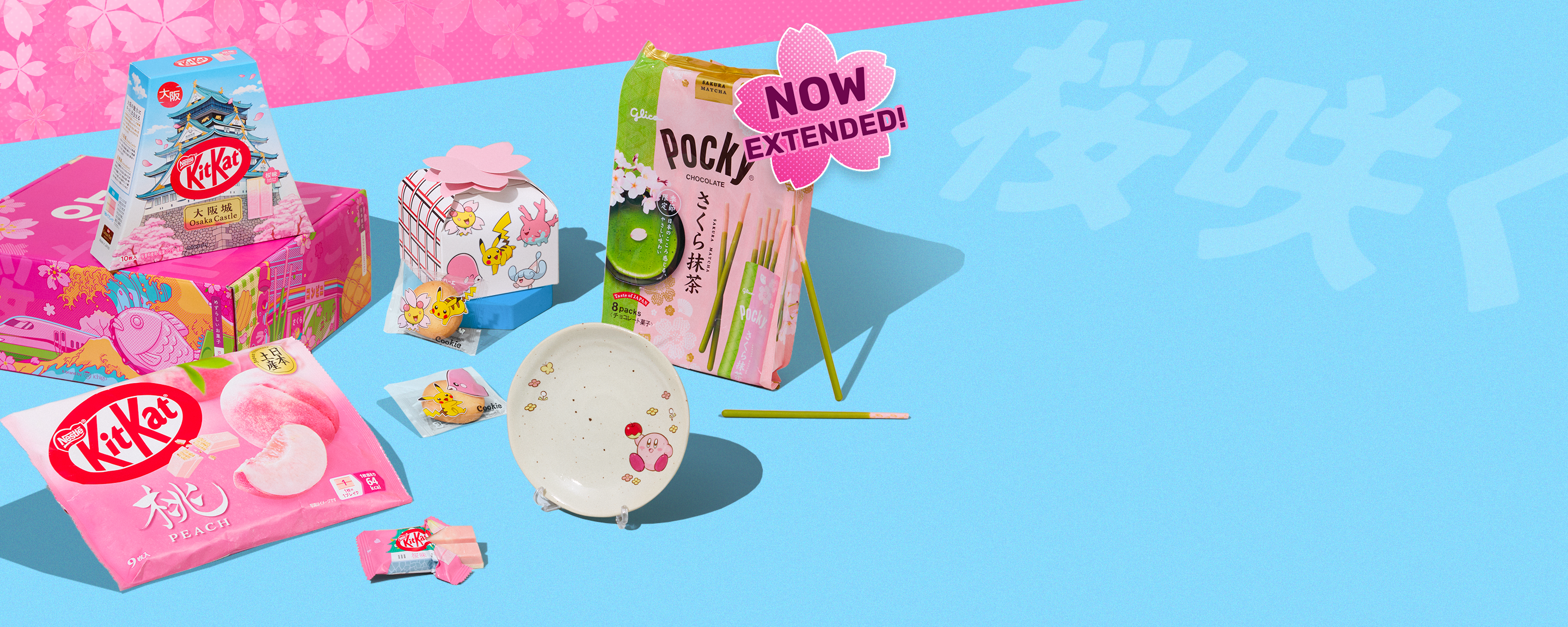 Sakura snacks and Kirby plate on blue background