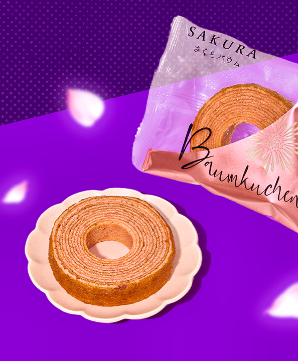 Sakura roll cake on plate featured on purple background