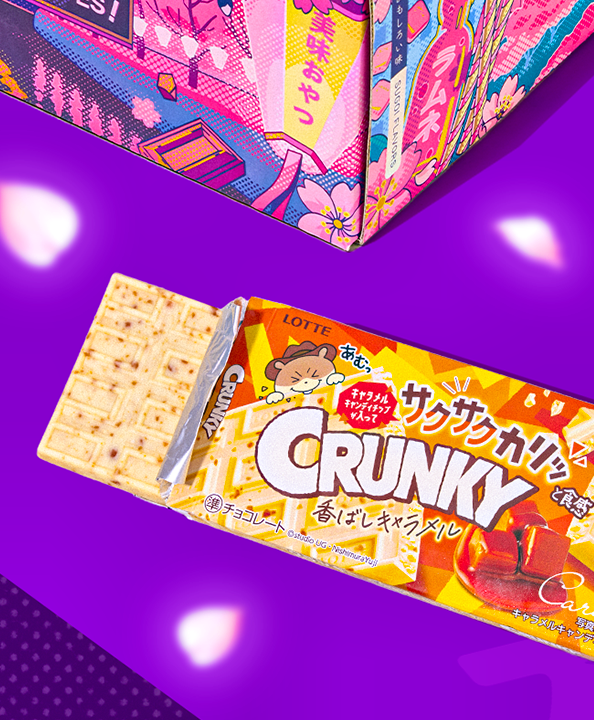 CRUNKY caramel white chocolate bar on purple background