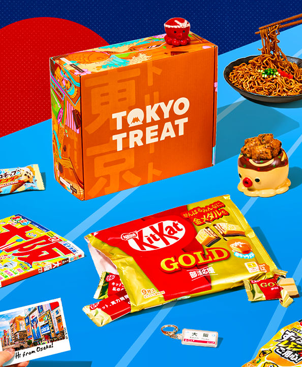 Orange TokyoTreat box with Osaka-themed snacks around it and red sun in the background