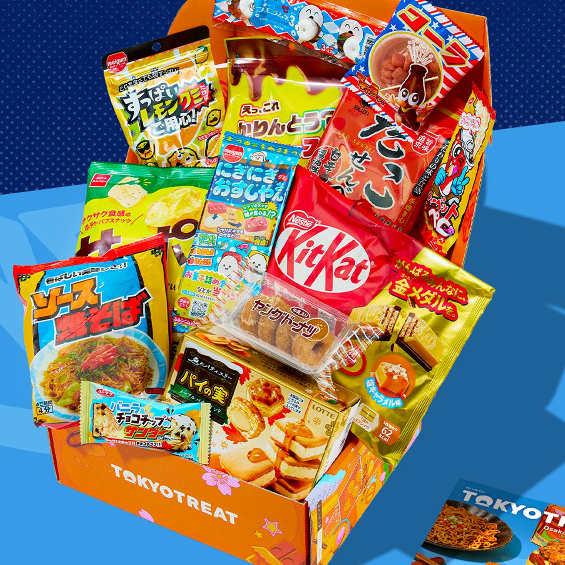 Orange TokyoTreat box with Osaka-themed snacks on blue background
