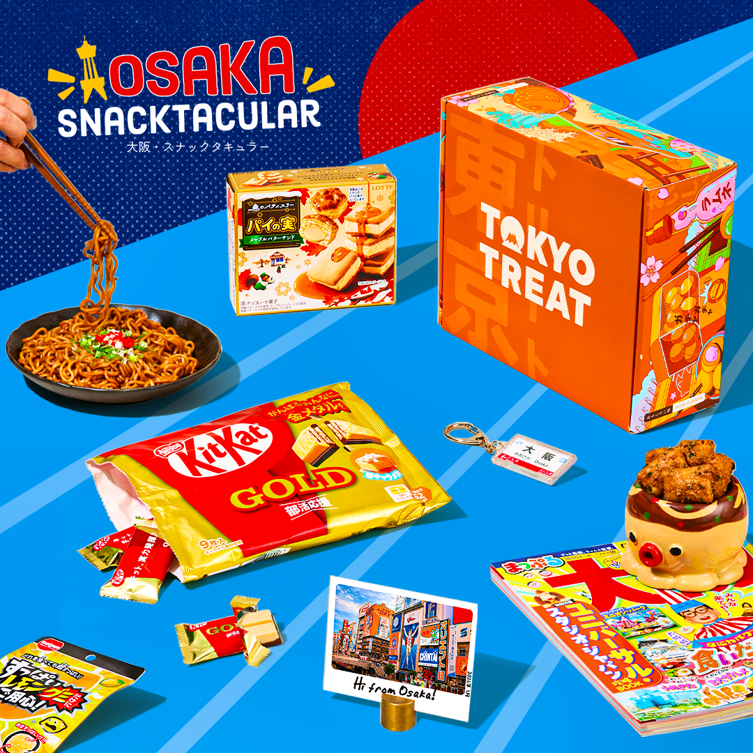 Orange TokyoTreat box with Osaka-themed snacks on blue background with red sun in the back