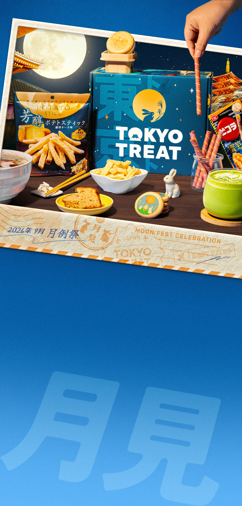A blue box surrounded with snacks inside a polaroid photo on a blue background