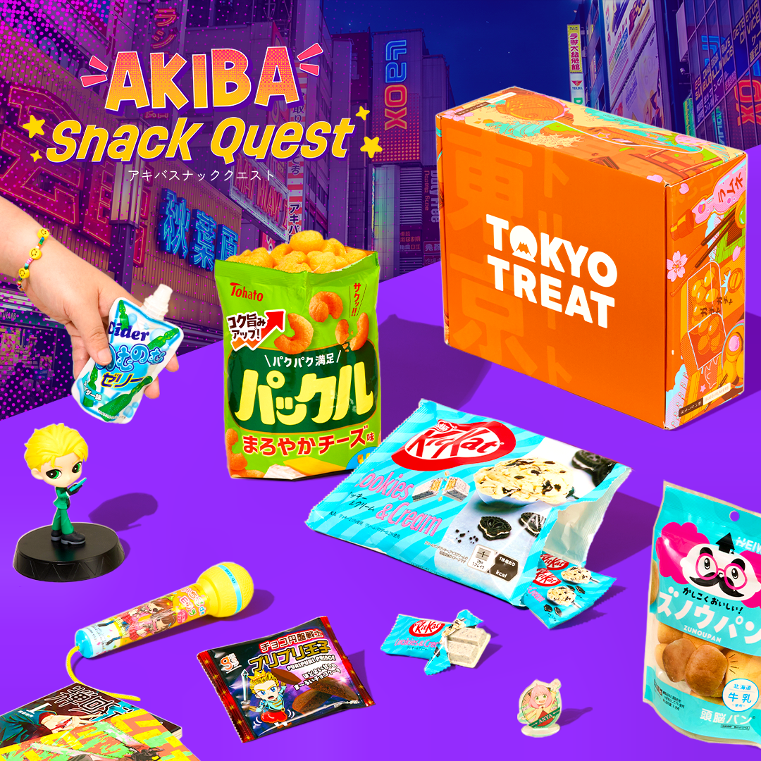 Orange TokyoTreat box on purple background with Akihabara-themed snacks around it