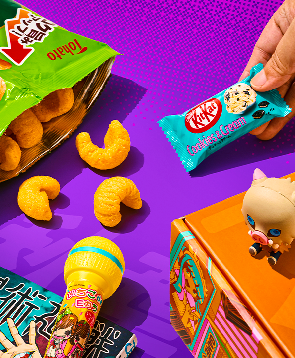 Akiba-themed snacks on purple background with Inosuke figure on TokyoTreat box