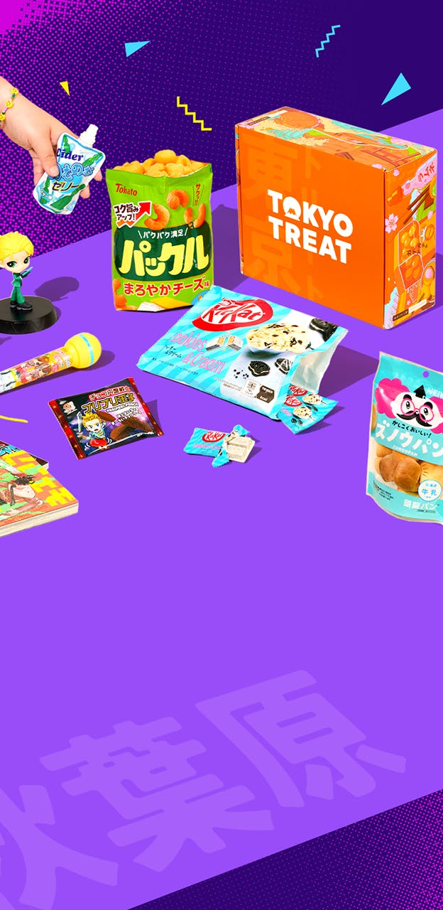 Orange TokyoTreat box with Akiba-themed snacks around it on purple background