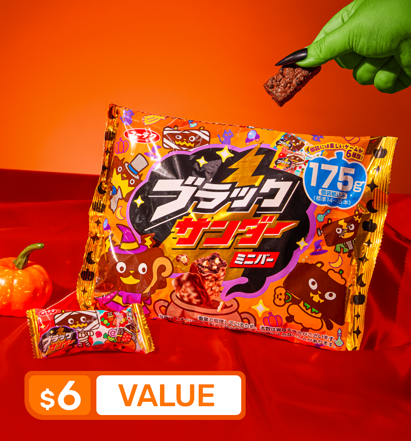A pack of Black Thunder Chocolate on a red and orange background