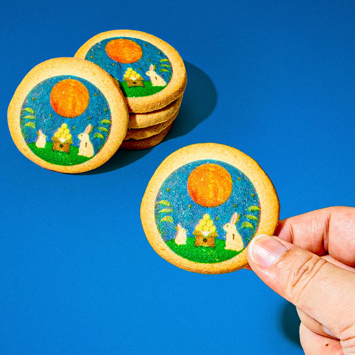 Rabbit-printed biscuit cookies on a blue background